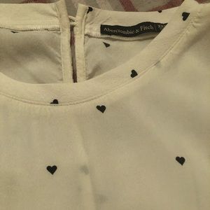 White blouse with polka hearts
